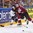 COLOGNE, GERMANY - MAY 16: Germany's Frank Hordler #48 and Latvia's Kaspars Daugavins #16 battle for the loose puck during preliminary round action at the 2017 IIHF Ice Hockey World Championship. (Photo by Andre Ringuette/HHOF-IIHF Images)

